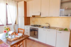 Kuchyň nebo kuchyňský kout v ubytování B&B Puerto Seguro
