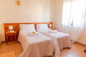 Postel nebo postele na pokoji v ubytování B&B Puerto Seguro