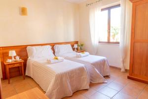 Postel nebo postele na pokoji v ubytování B&B Puerto Seguro