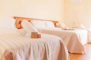 Postel nebo postele na pokoji v ubytování B&B Puerto Seguro