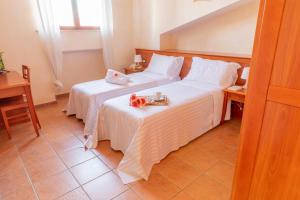Postel nebo postele na pokoji v ubytování B&B Puerto Seguro