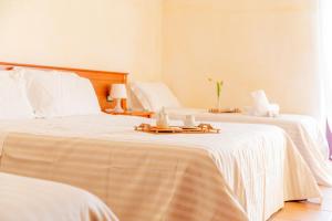 Postel nebo postele na pokoji v ubytování B&B Puerto Seguro