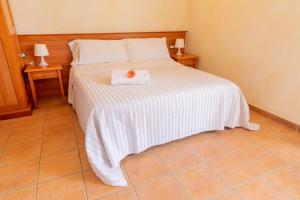 Postel nebo postele na pokoji v ubytování B&B Puerto Seguro