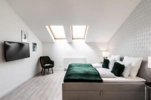 Televízia a/alebo spoločenská miestnosť v ubytovaní Quiet very central & stylish apt