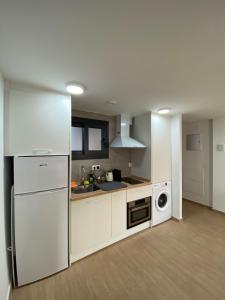 Una cocina o zona de cocina en Modern central flat with private parking