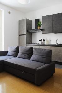 A kitchen or kitchenette at M&M Apartment