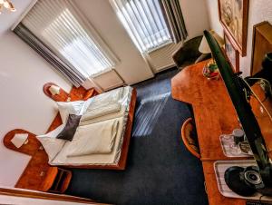 Posezení v ubytování Hotel am Rathaus