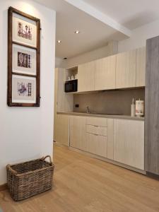 Η κουζίνα ή μικρή κουζίνα στο BMP APARTMENT EDELWEISS PASSO DEL TONALE