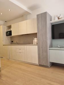 Η κουζίνα ή μικρή κουζίνα στο BMP APARTMENT EDELWEISS PASSO DEL TONALE