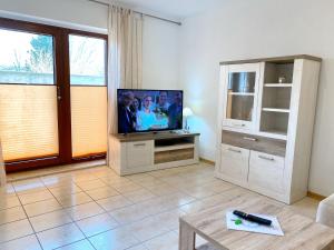 TV/Unterhaltungsangebot in der Unterkunft Ferienwohnungen Stadtmitte - Fewo 1