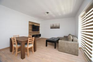 TV a/nebo společenská místnost v ubytování Zanes Apartment