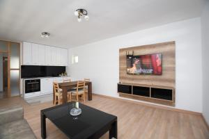 Kuchyň nebo kuchyňský kout v ubytování Zanes Apartment + 10 fotografií