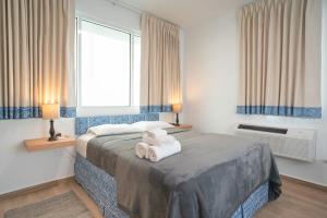 Postel nebo postele na pokoji v ubytování Casa Condado Hotel & Residences