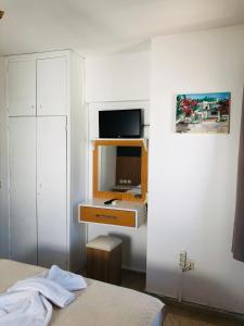 TV a/nebo společenská místnost v ubytování Kılavuz otel