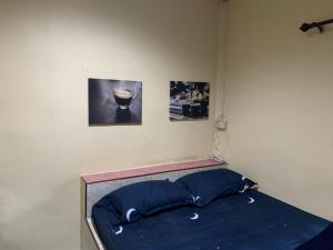 Postel nebo postele na pokoji v ubytování วังตาน้ำรีสอร์ท