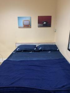 Postel nebo postele na pokoji v ubytování วังตาน้ำรีสอร์ท