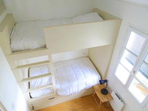Posteľ alebo postele v izbe v ubytovaní Iris Bel appartement à 100m du Port