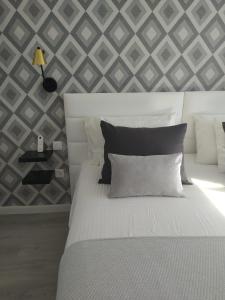 Posteľ alebo postele v izbe v ubytovaní Apartment VOLVORETA - Pool view- Good Wifi - Smart TV - Residence Atlantic View