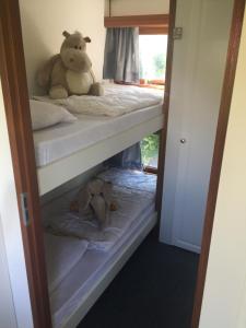 Postel nebo postele na pokoji v ubytování Do's Chalets