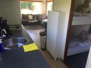 Kuchyň nebo kuchyňský kout v ubytování Do's Chalets