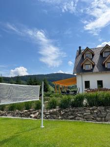 a soccer goal in front of a house at Miodówka in Stronie Śląskie