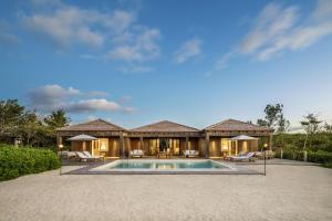 Fotografie z fotogalerie ubytování COMO Parrot Cay v destinaci Sandy Point