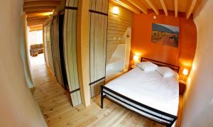 Tempat tidur dalam kamar di La Ligule