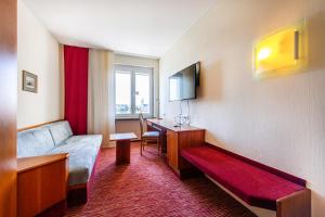 TV a/nebo společenská místnost v ubytování Diehls Hotel
