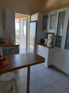 A kitchen or kitchenette at Derveni Summer House