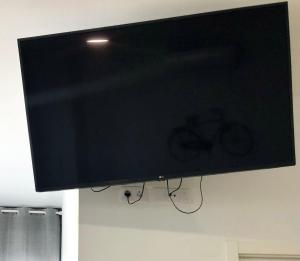 Telewizja i/lub zestaw kina domowego w obiekcie Apartamento Fuerteventura