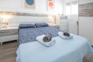 Posteľ alebo postele v izbe v ubytovaní Apartamento Ooh La Lá Cádiz