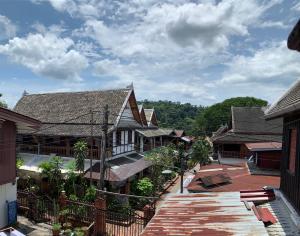 an overhead view of a village with houses at Siridel Luang Prabang in Luang Prabang