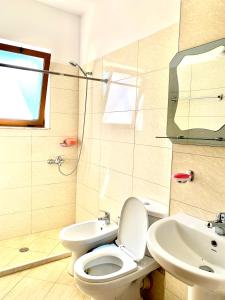 A bathroom at Syzo Apartments