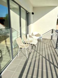 Balkón alebo terasa v ubytovaní Apartman 001