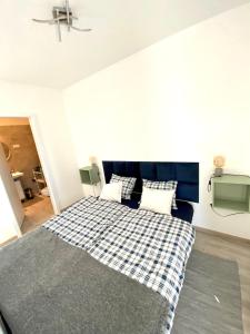 Posteľ alebo postele v izbe v ubytovaní Apartman 001