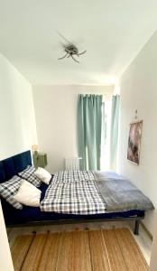 Posteľ alebo postele v izbe v ubytovaní Apartman 001