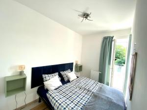 Posteľ alebo postele v izbe v ubytovaní Apartman 001
