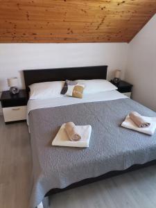 Postel nebo postele na pokoji v ubytování Apartment Dolores