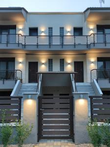 an external view of a building with lights at Sunny Siviri in Siviri