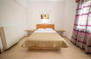 Postel nebo postele na pokoji v ubytování Bay View Apts II