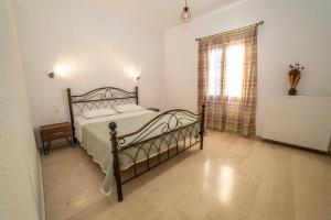 Postel nebo postele na pokoji v ubytování Bay View Apts II