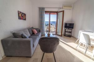TV a/nebo společenská místnost v ubytování Bay View Apts II