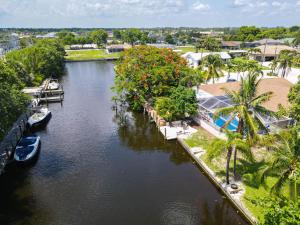 an aerial view of a river with boats in it at Waterfront Pool Villa with Sailboat access in Cape Coral +28 photos