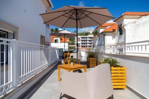 En balkon eller terrasse på Vila Farol