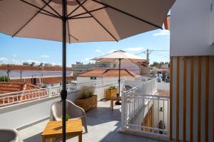 En balkon eller terrasse på Vila Farol