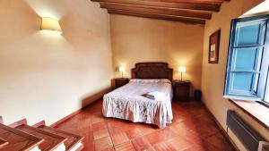 Postel nebo postele na pokoji v ubytování Casa Tinoco Casa Rural Categoria Superior