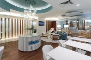 Posezení v ubytování Melia Lisboa Oriente Hotel