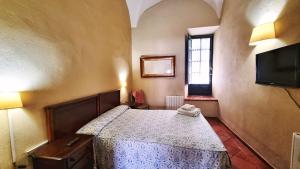 Postel nebo postele na pokoji v ubytování Casa Tinoco Casa Rural Categoria Superior