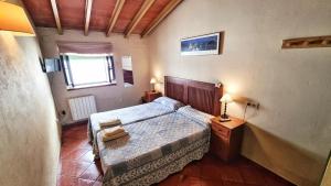 Postel nebo postele na pokoji v ubytování Casa Tinoco Casa Rural Categoria Superior