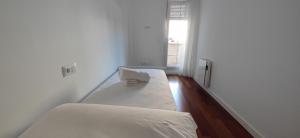Posteľ alebo postele v izbe v ubytovaní Mercado Cee Galitrips Apartment